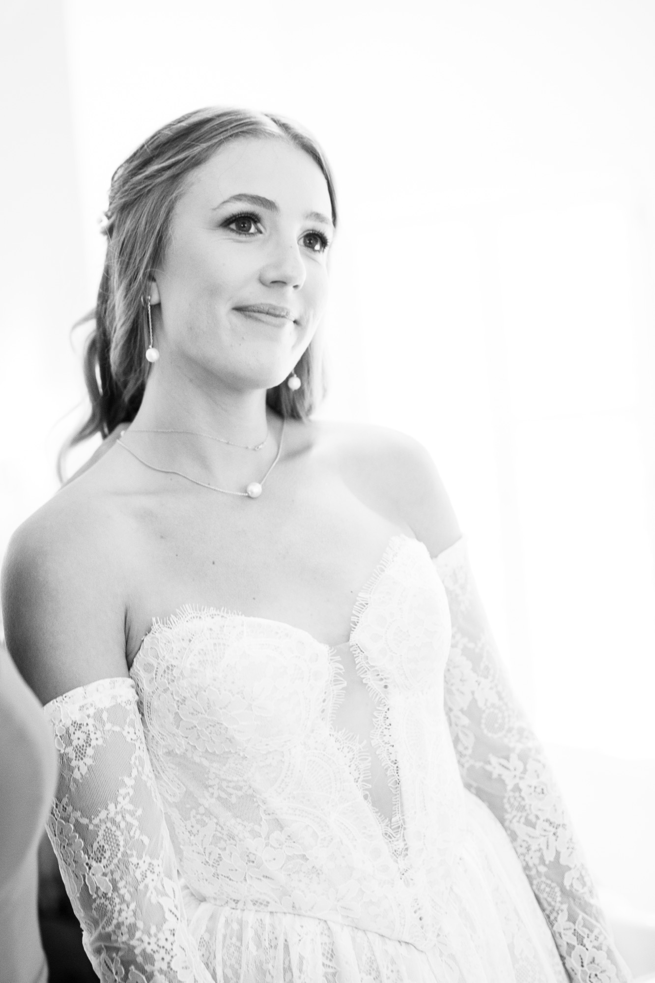 The bride by the window, in black and white