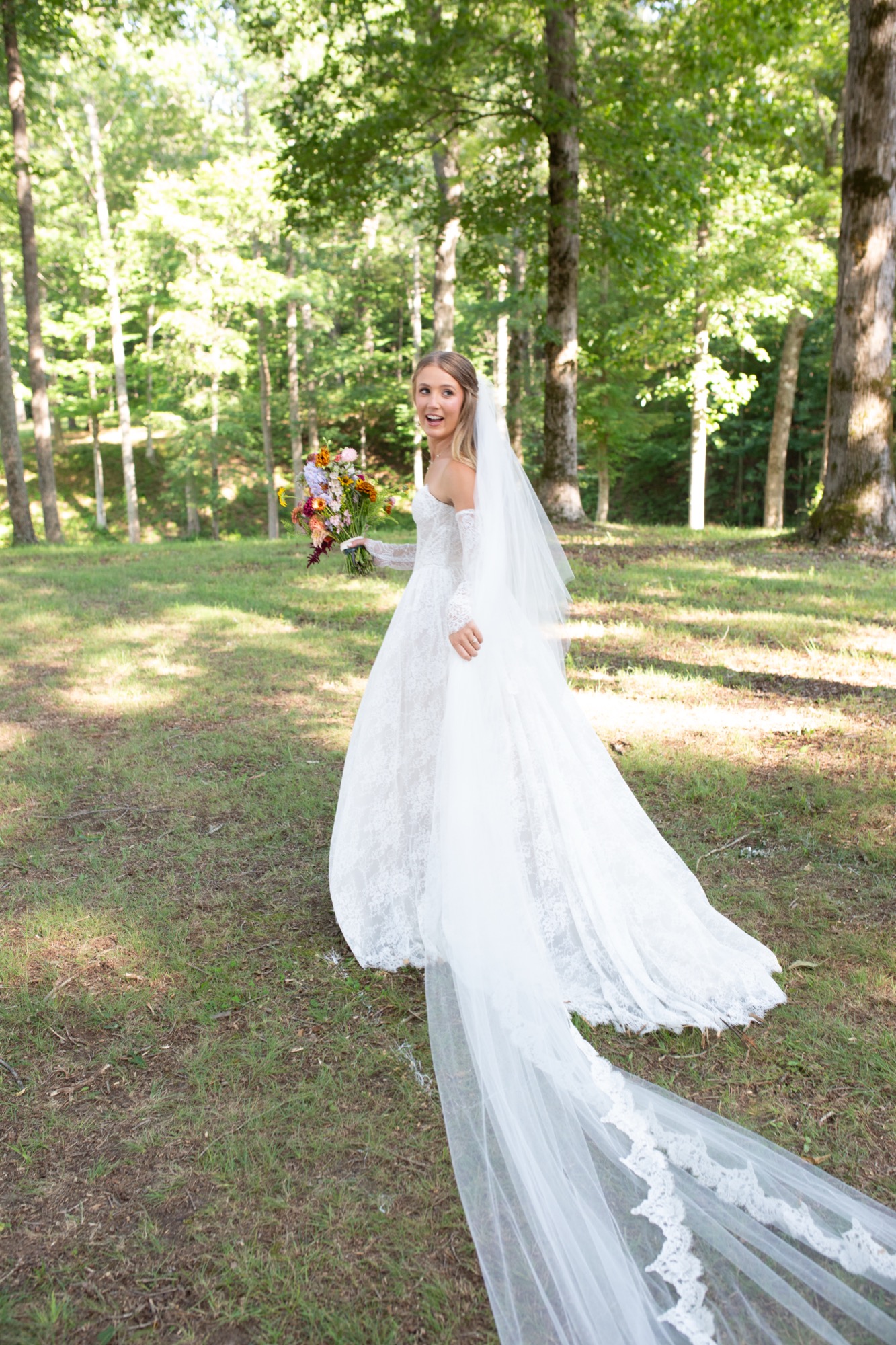 The veil trailing across the lawn