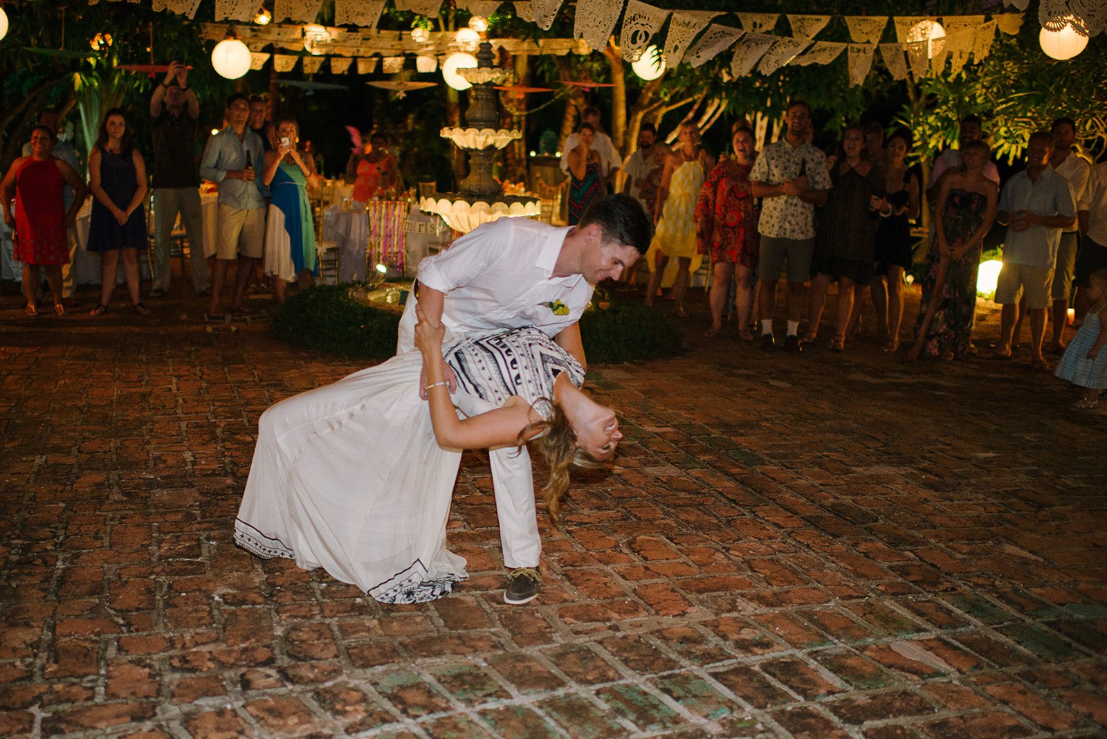 The groom dipping the bride