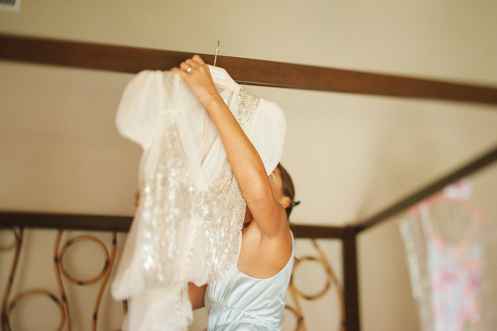 The gown lifted off its hanger
