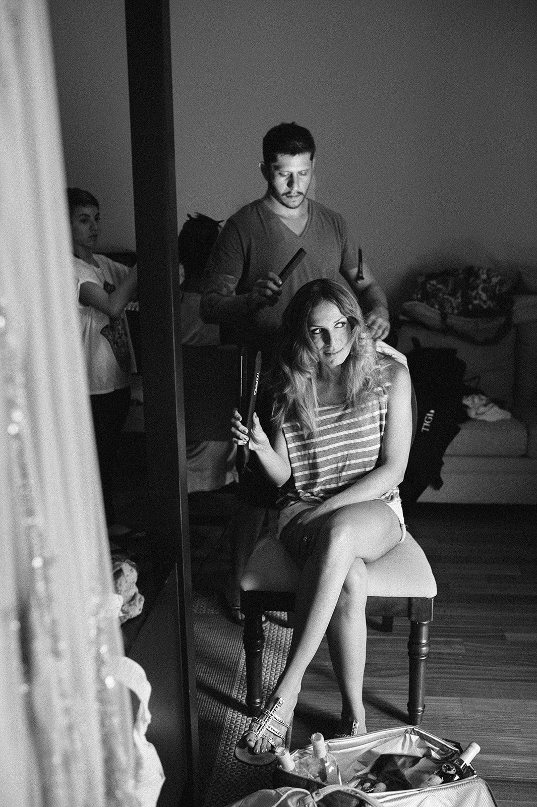 Getting ready in a doorway, in black and white