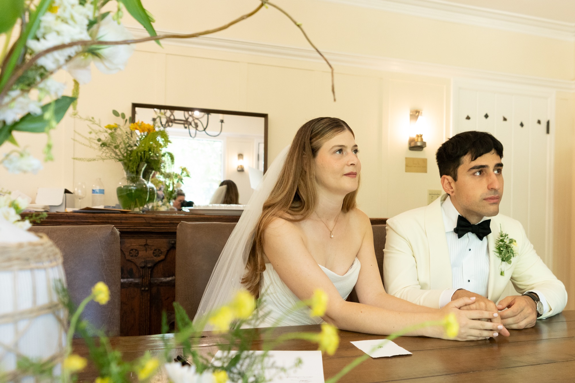 The couple signing the marriage license
