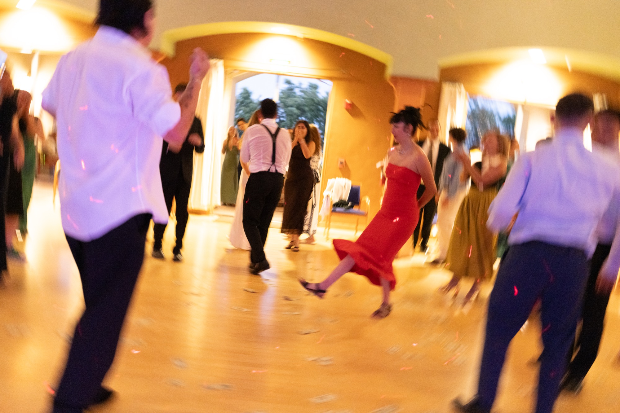 A guest kicking up her heels on the dance floor