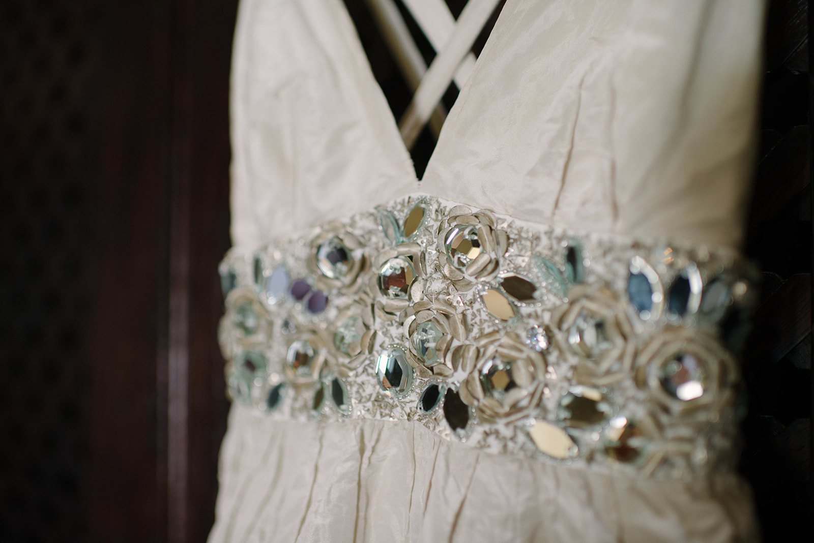 A jeweled belt on the gown
