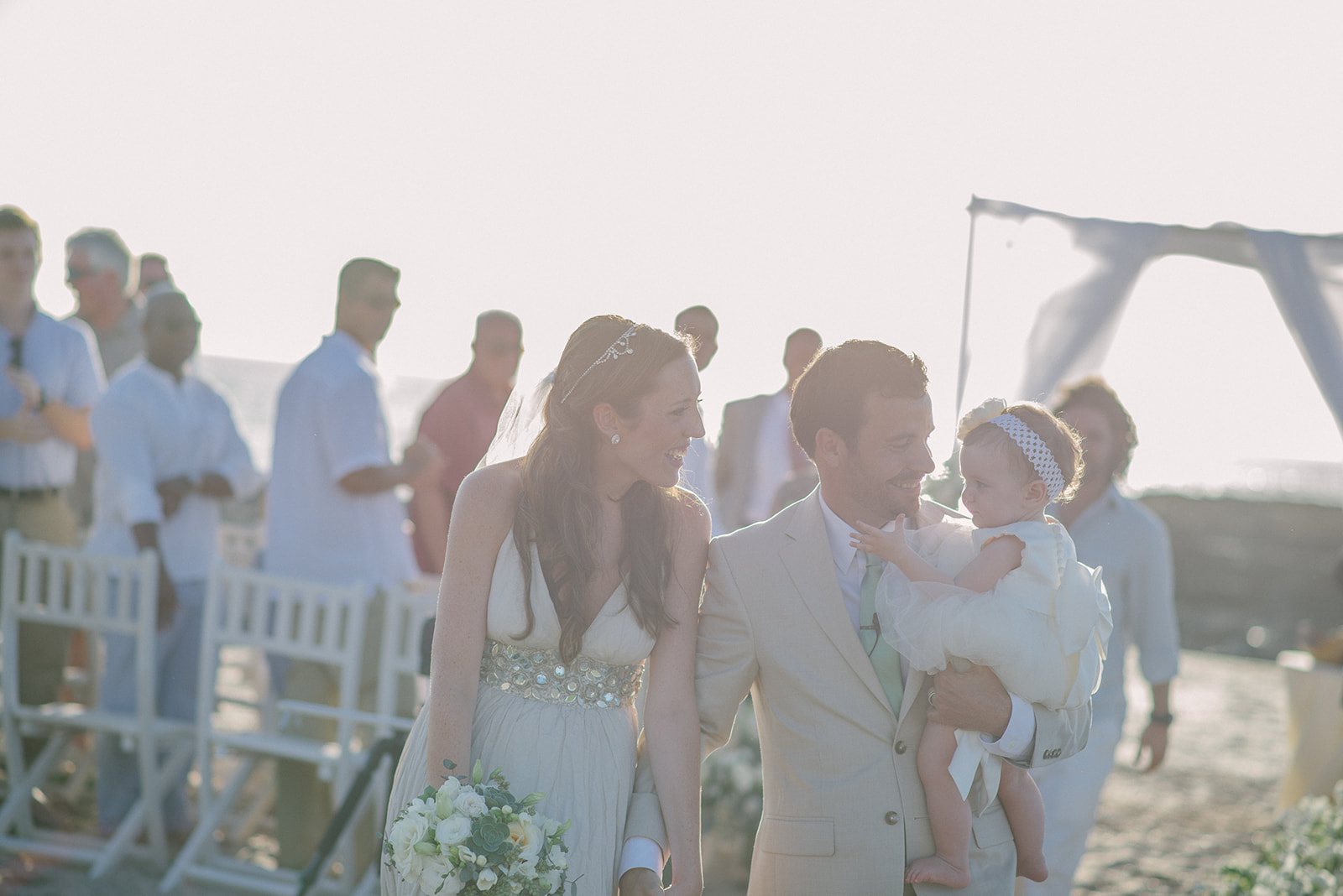 Guests on the beach after the ceremony