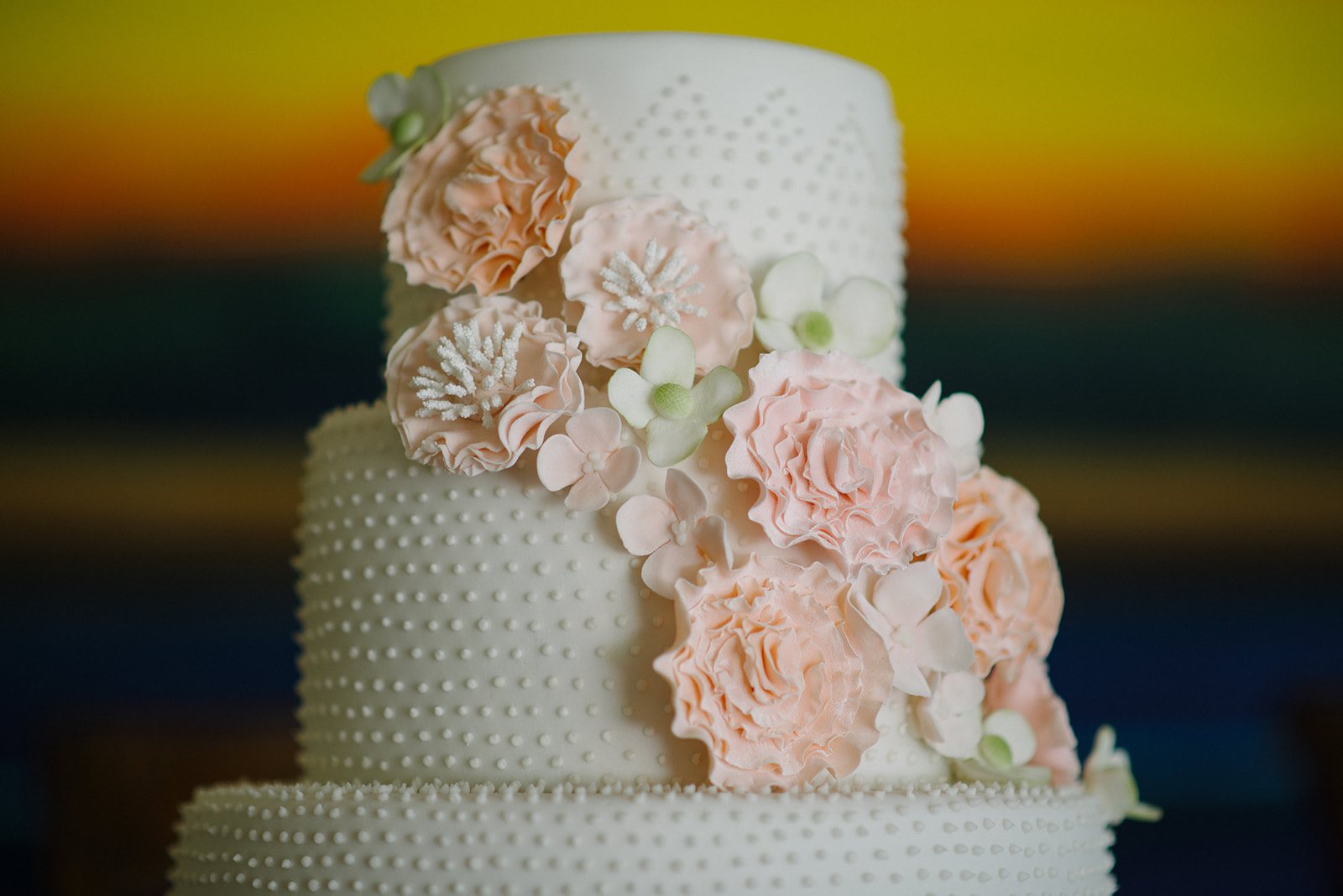 The cake against a sunset sky