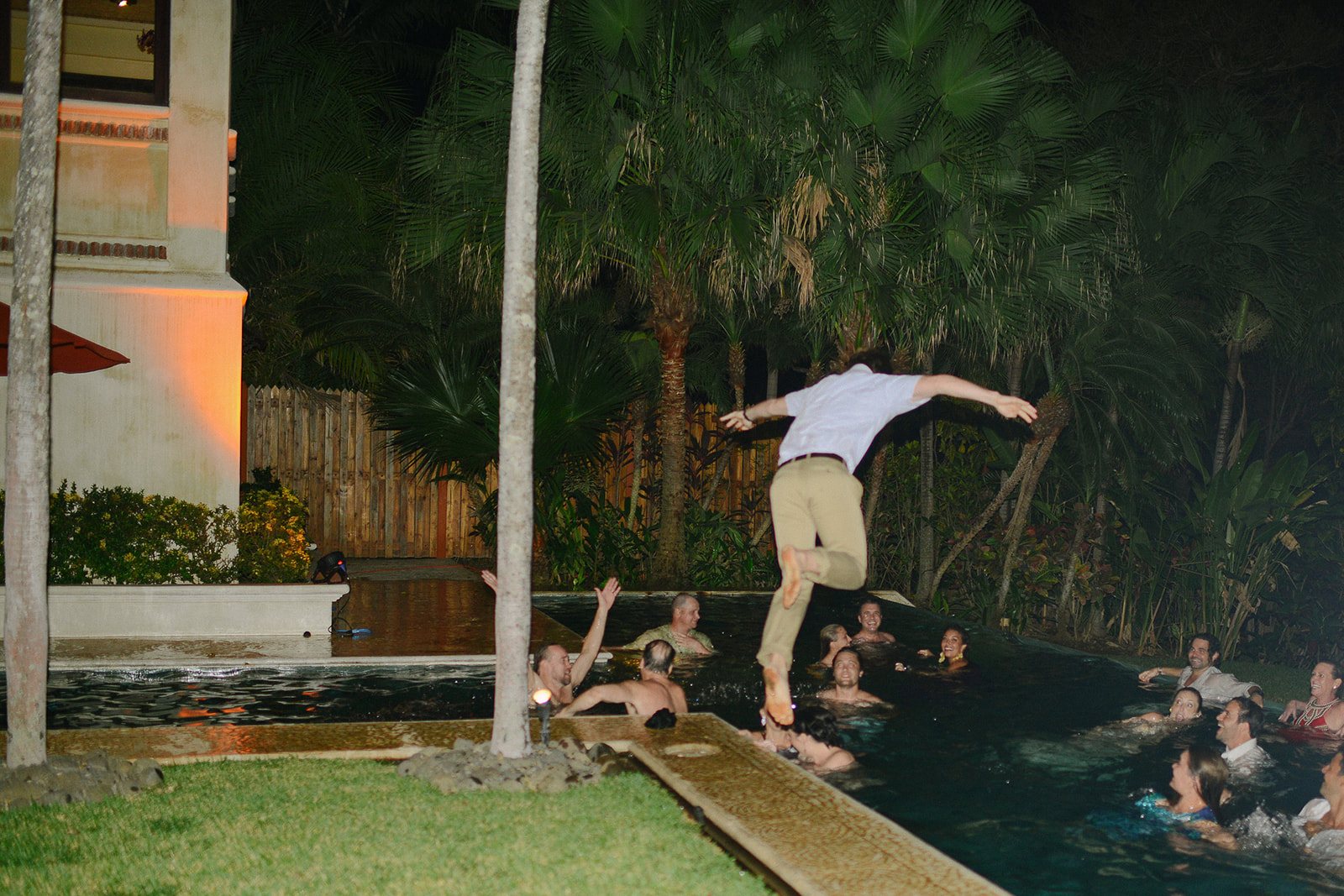 A guest leaping into the pool