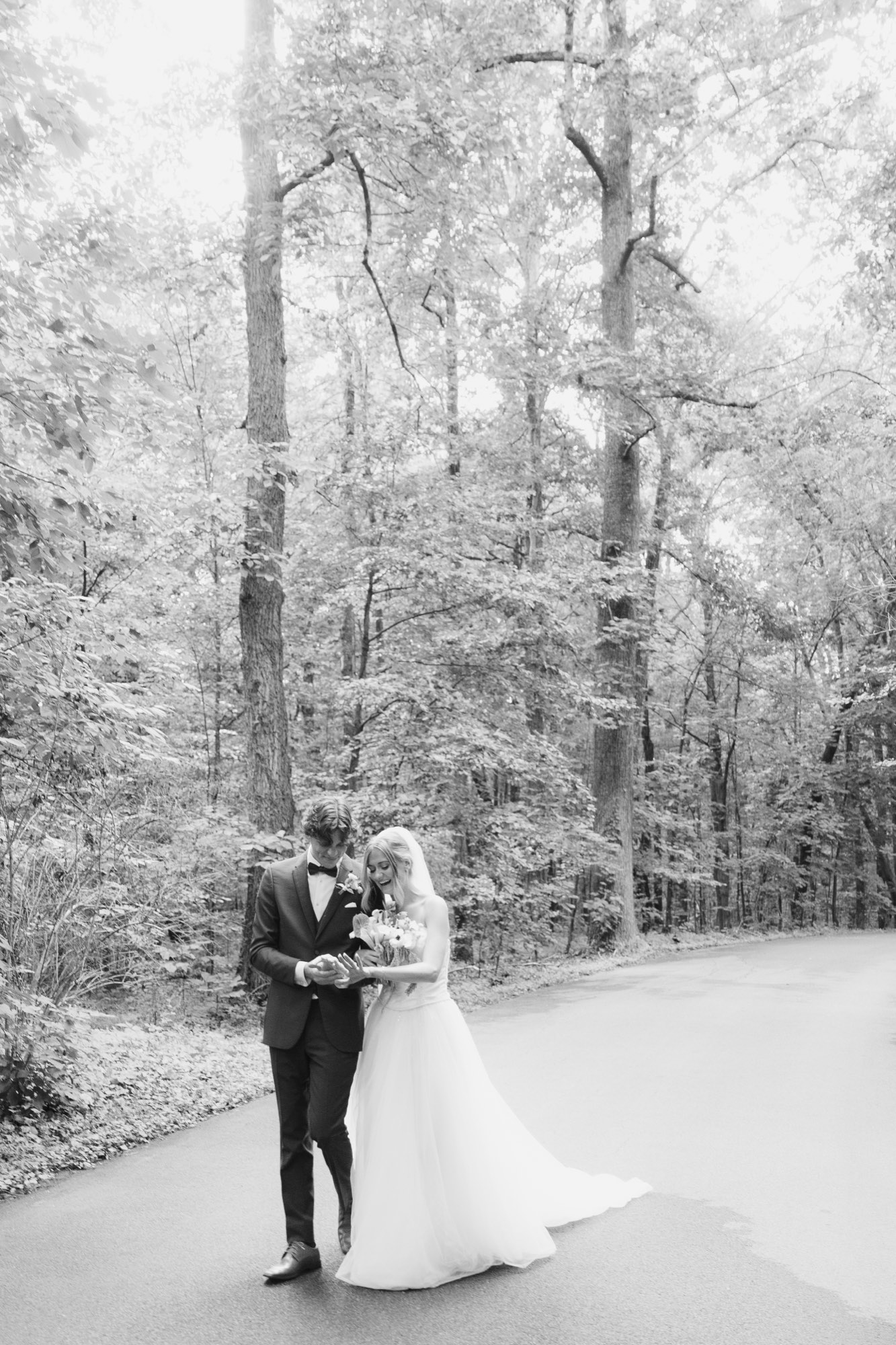 The couple walking the road, in black and white