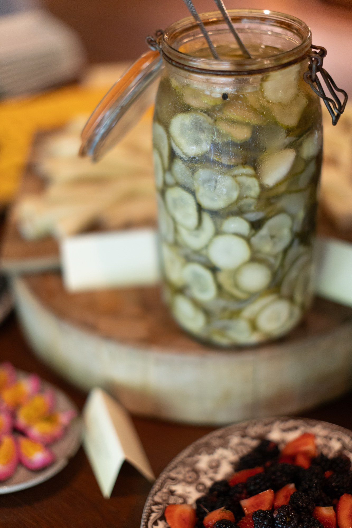 A jar of pickles on the grazing table
