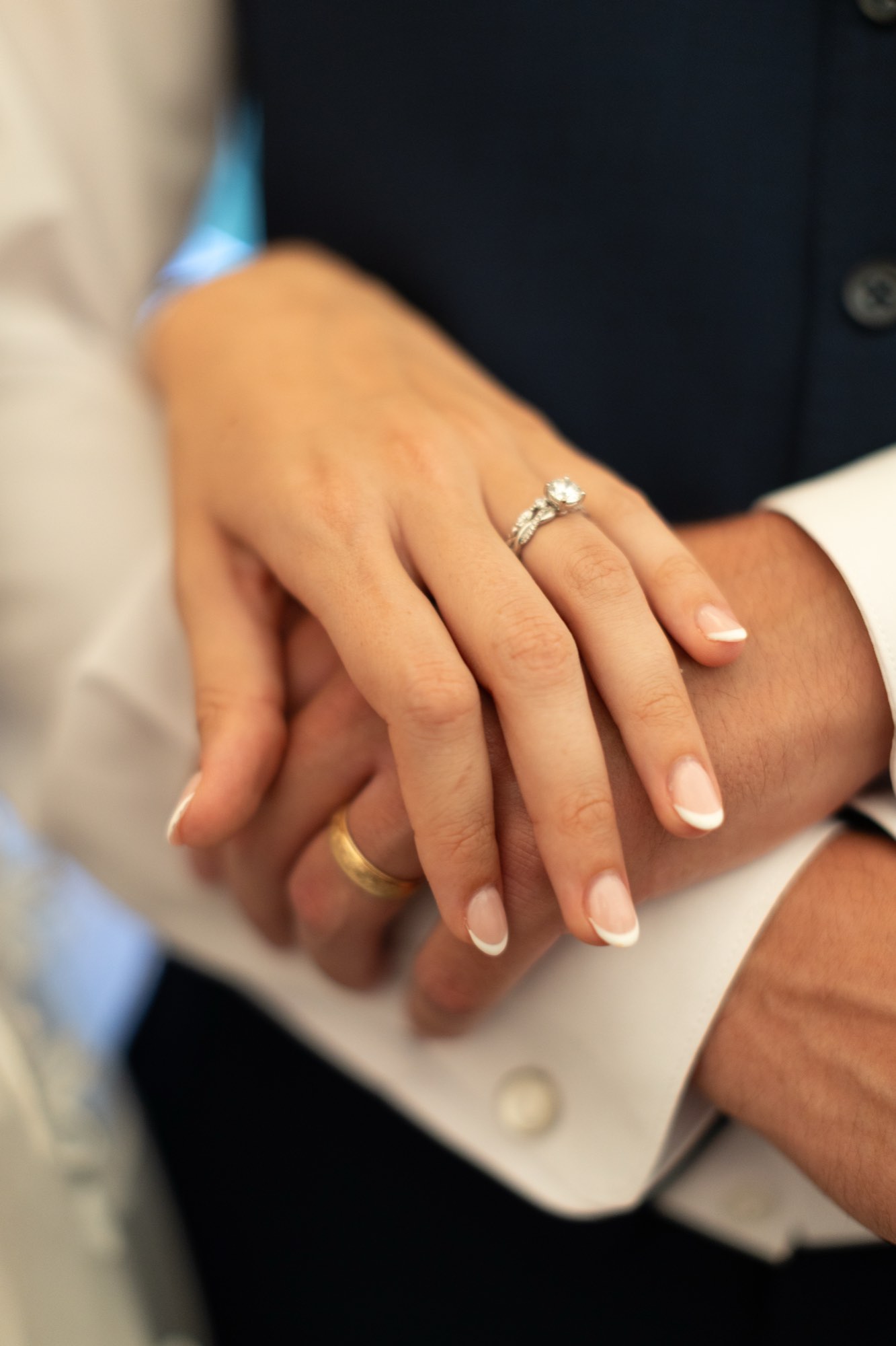 Hands with wedding rings