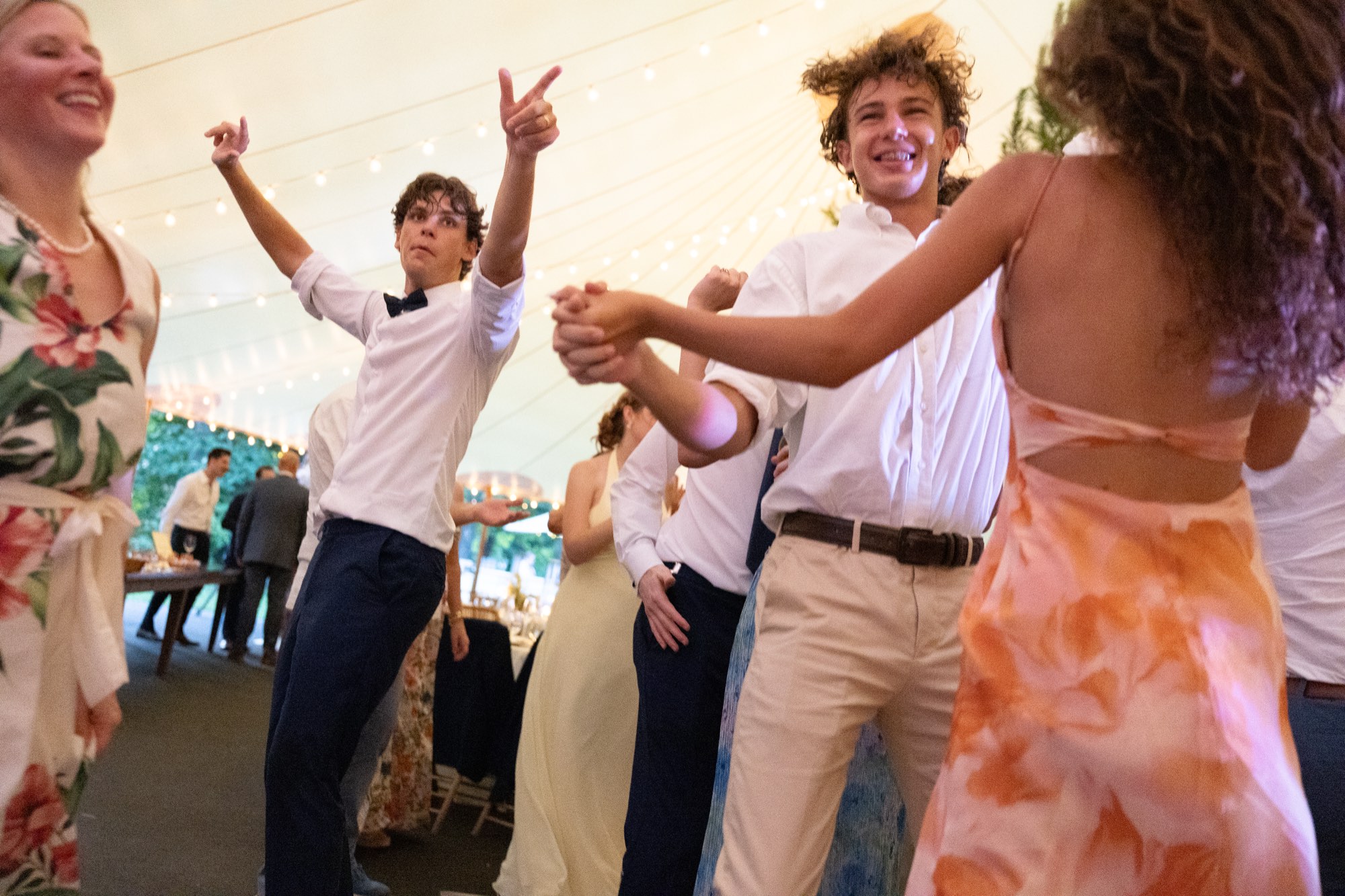 Dancers under the tent lights