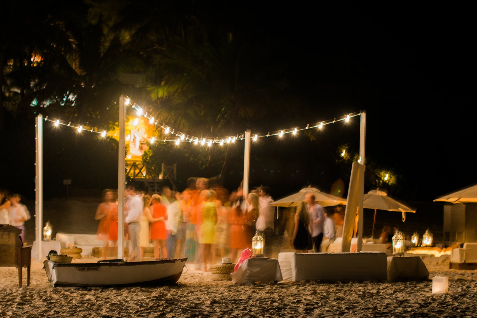 String lights at the rehearsal beach party