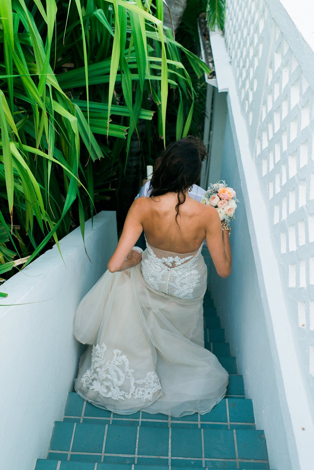The bride on the turquoise stairs