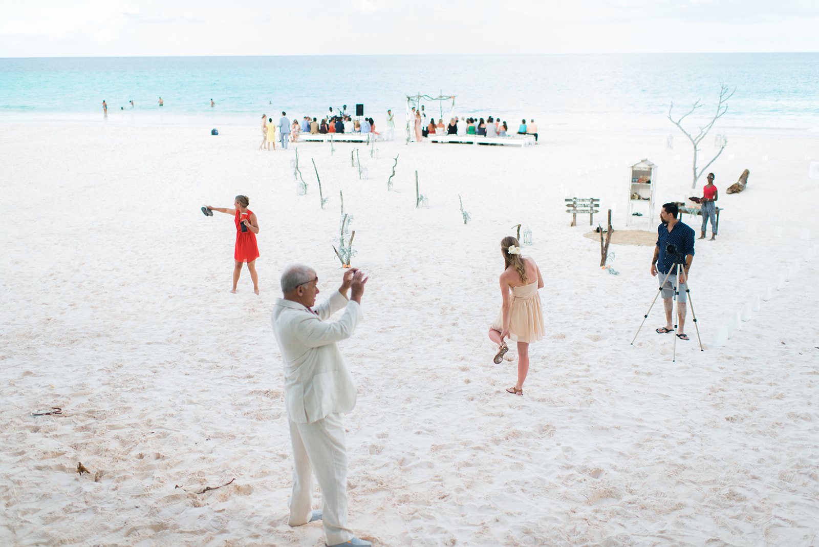 Guests on the pink sand
