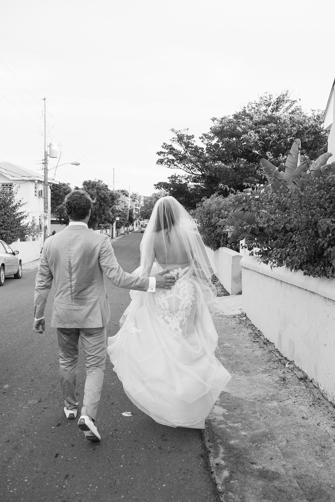 The couple walking the lane, in black and white