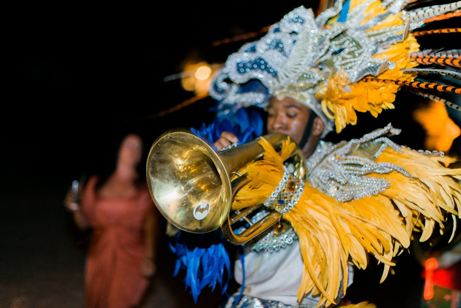 A Junkanoo dancer with a trumpet
