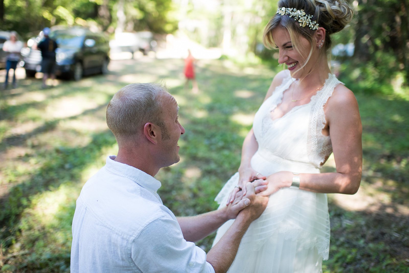 The couple laughing during the first look
