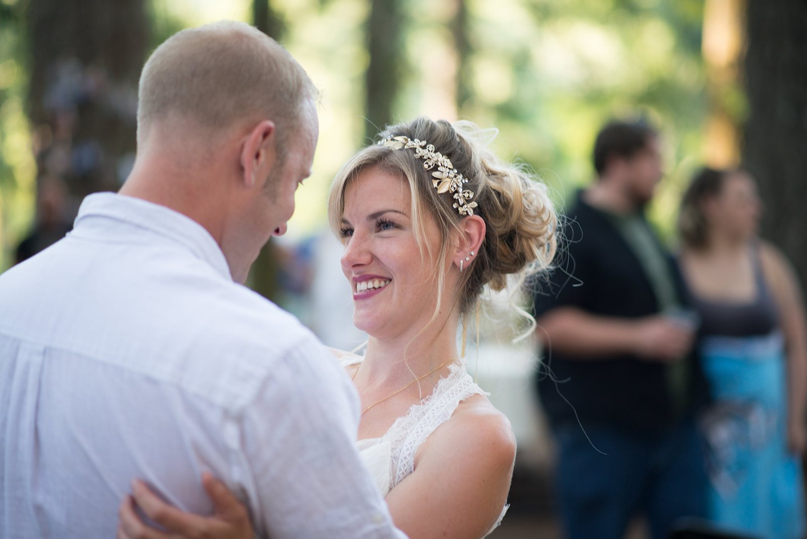 The bride laughing with friends