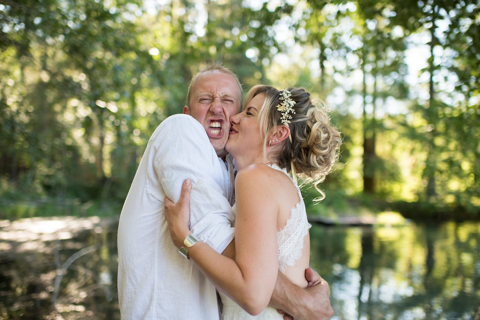 The couple close in the woods