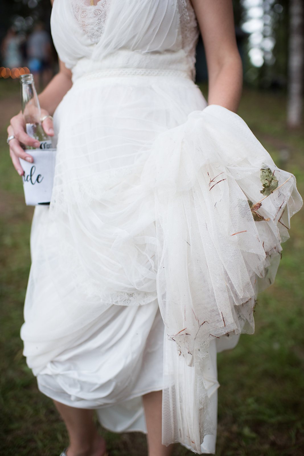 The bride lifting her skirt