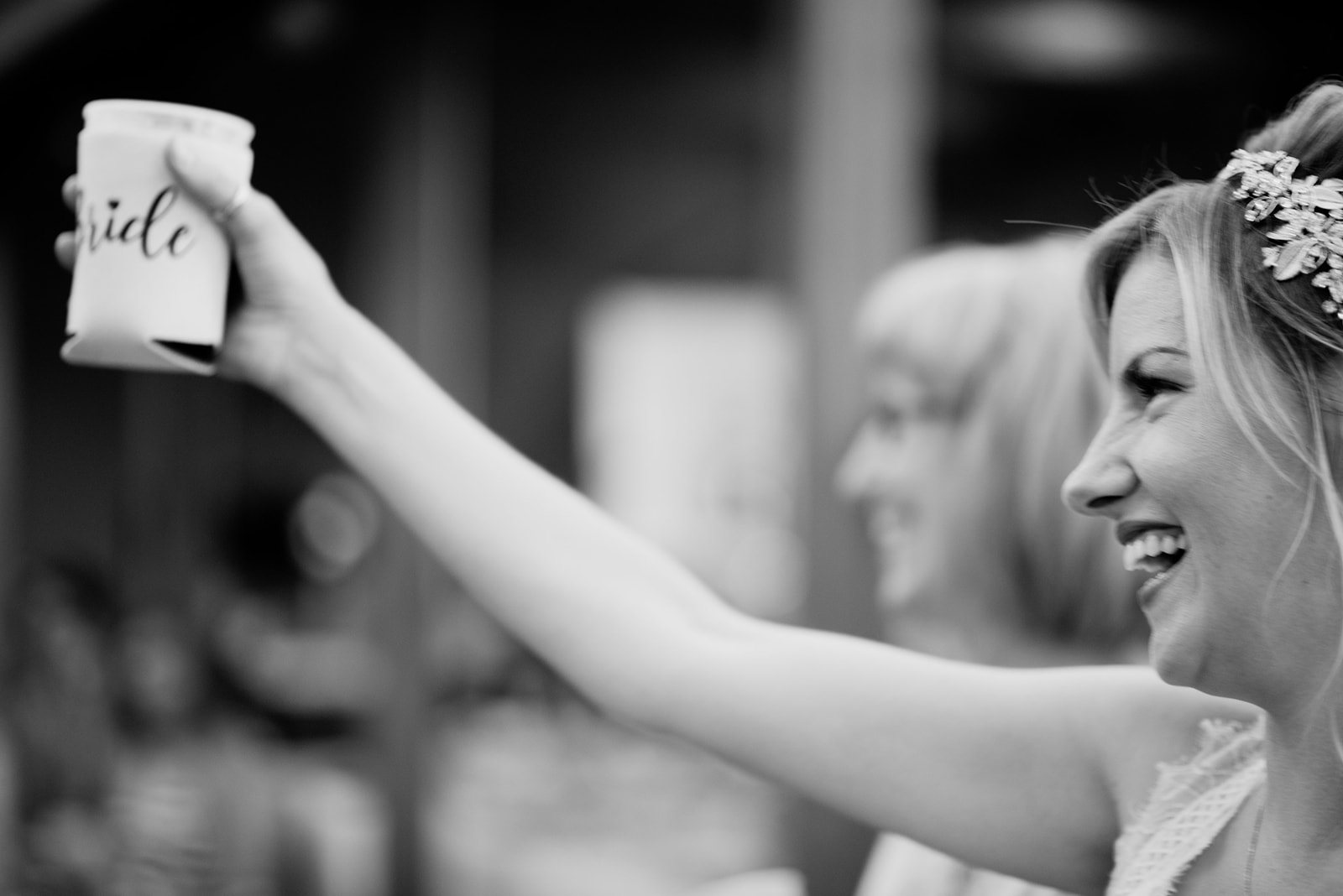 A toast raised, in black and white