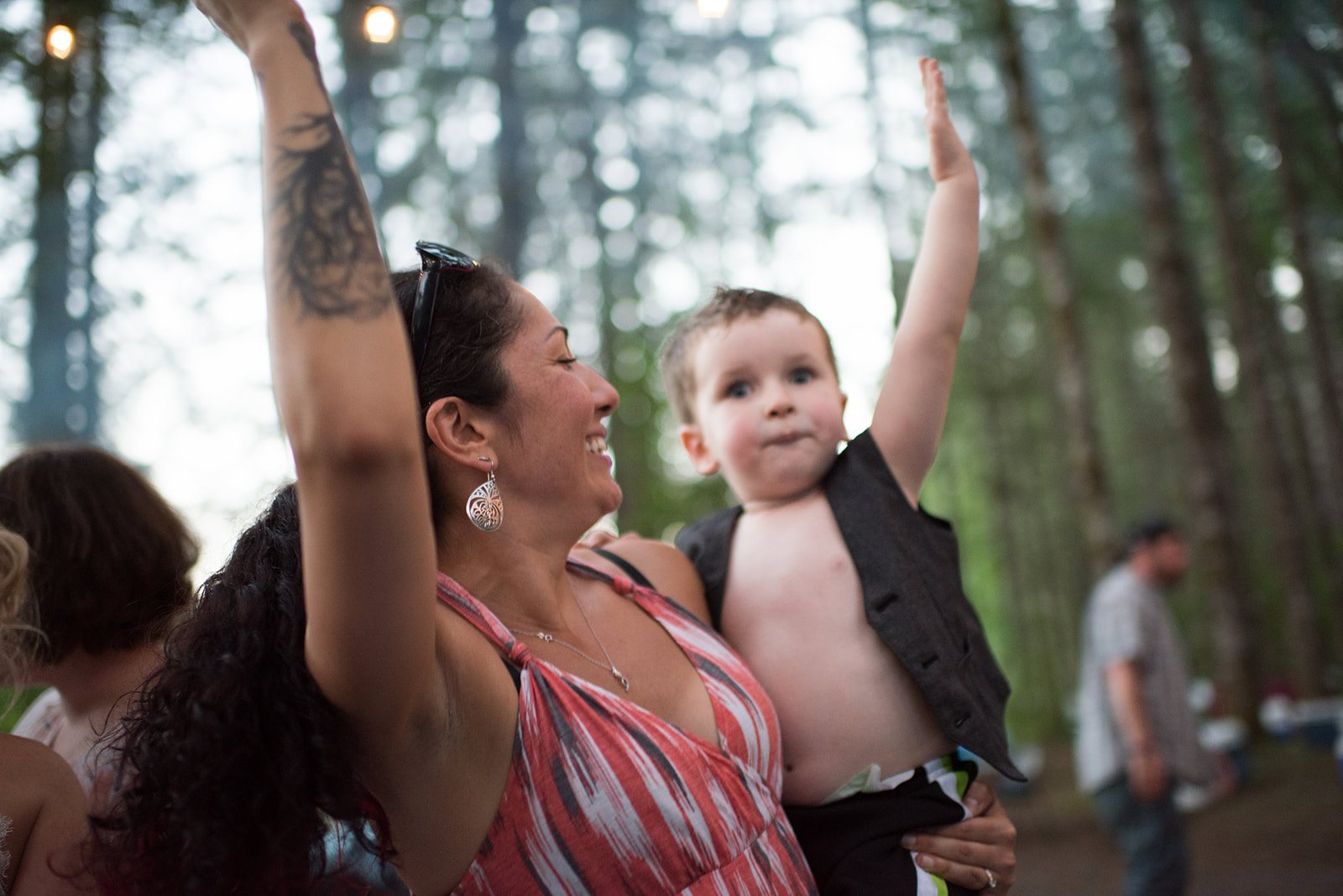 A guest dancing with a little boy