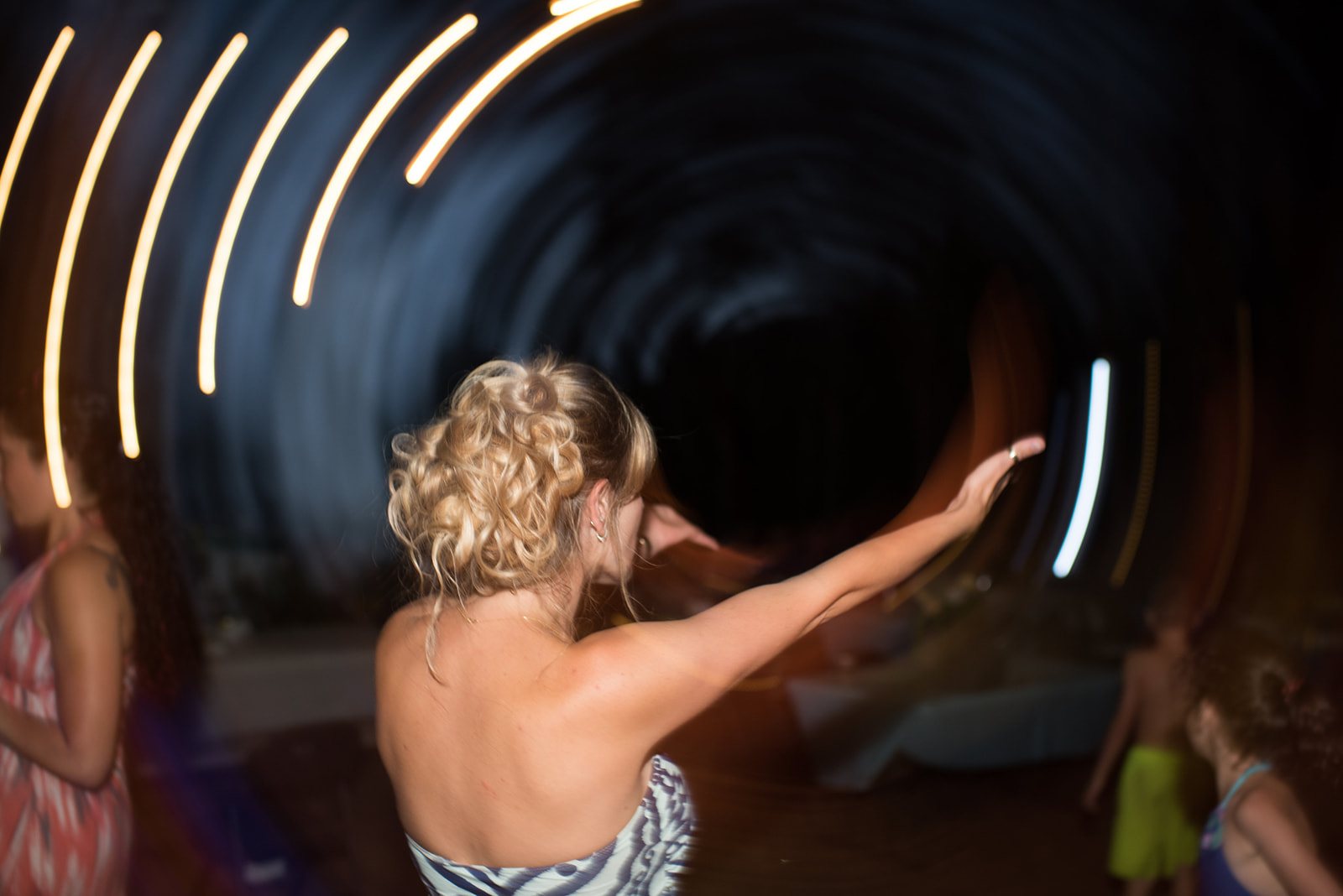 The bride dancing in trails of light