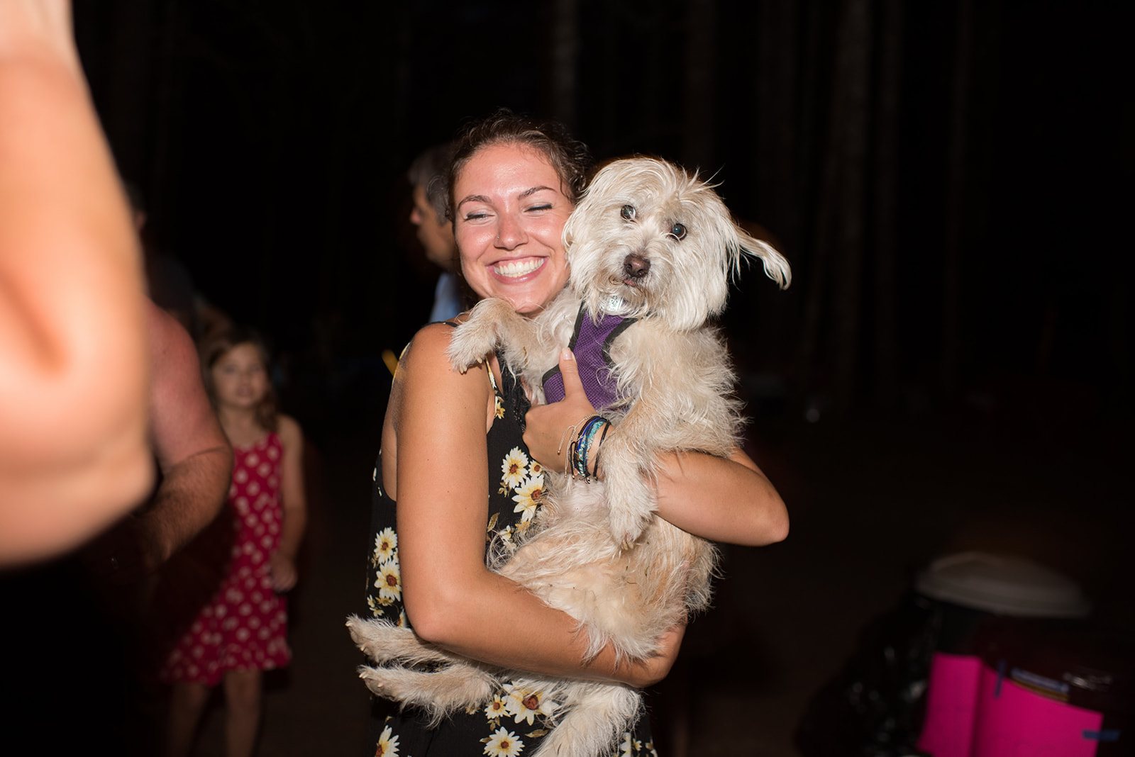 A guest dancing with her dog