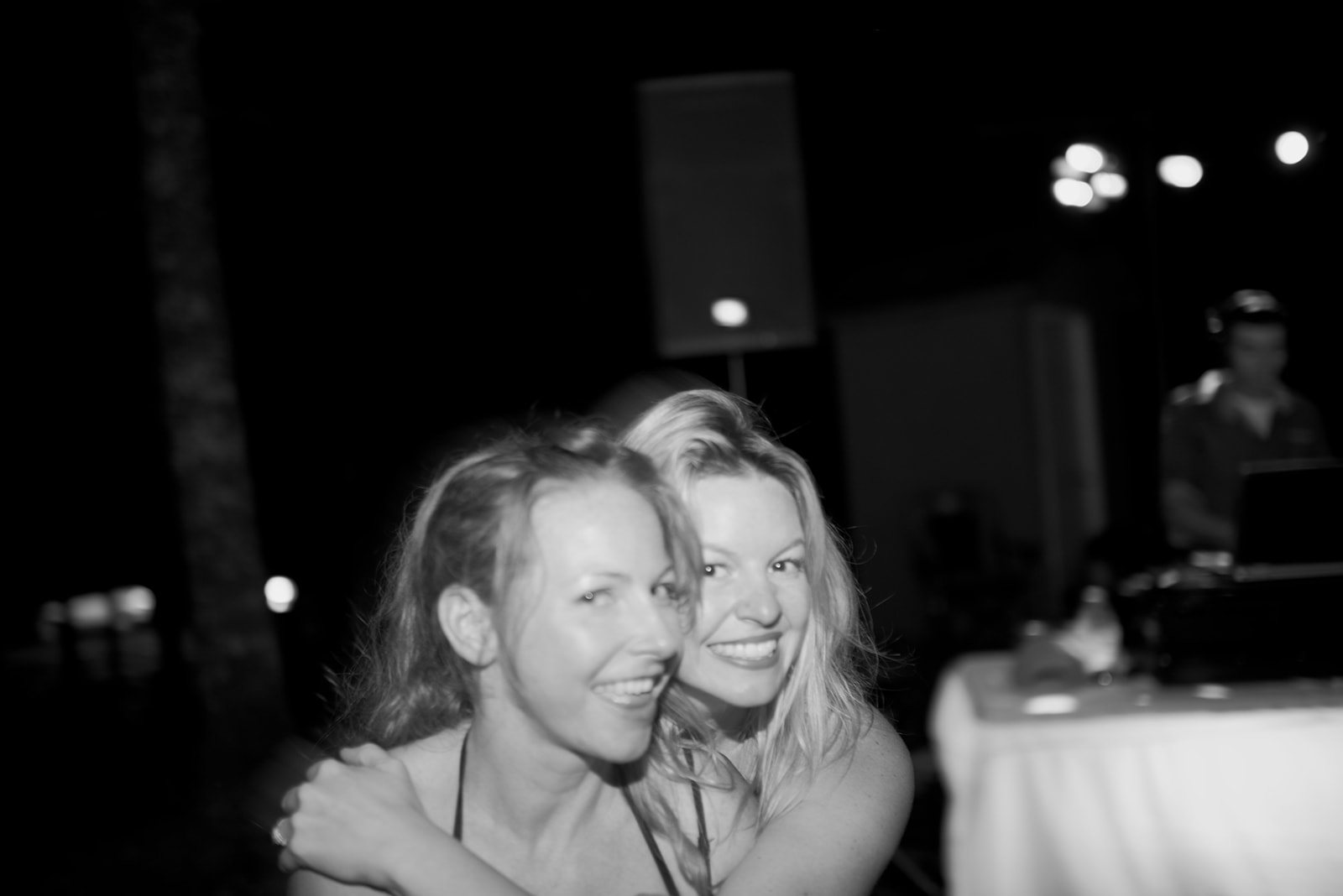 Friends at the reception, in black and white