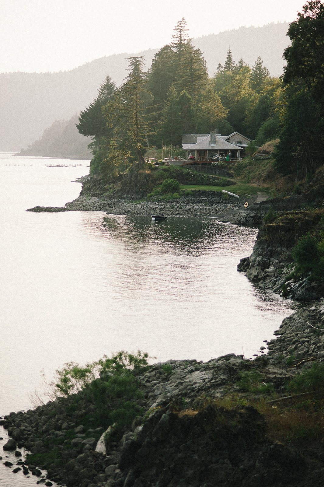 The river and a rocky point below the house