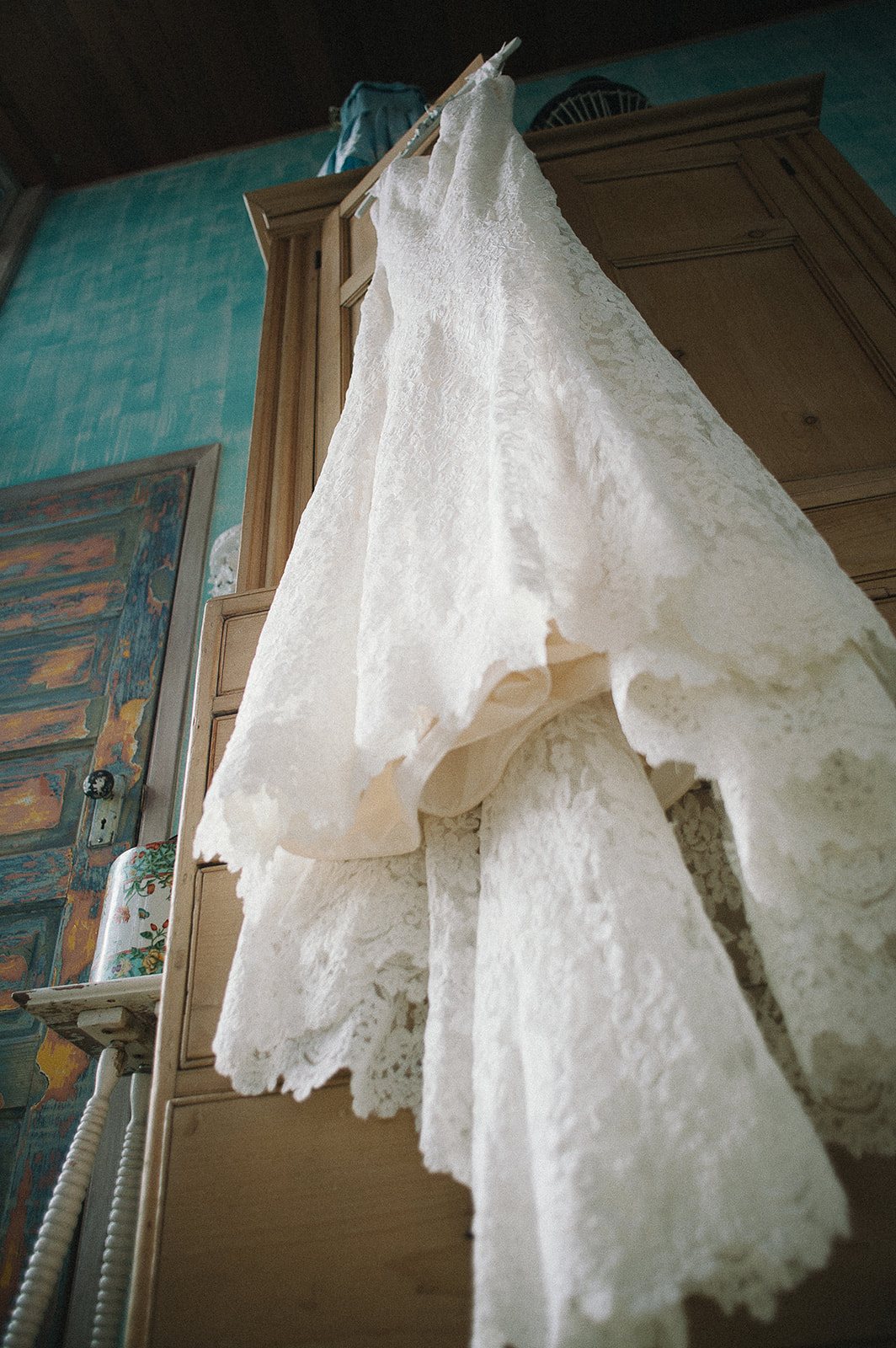 The gown hanging in the window