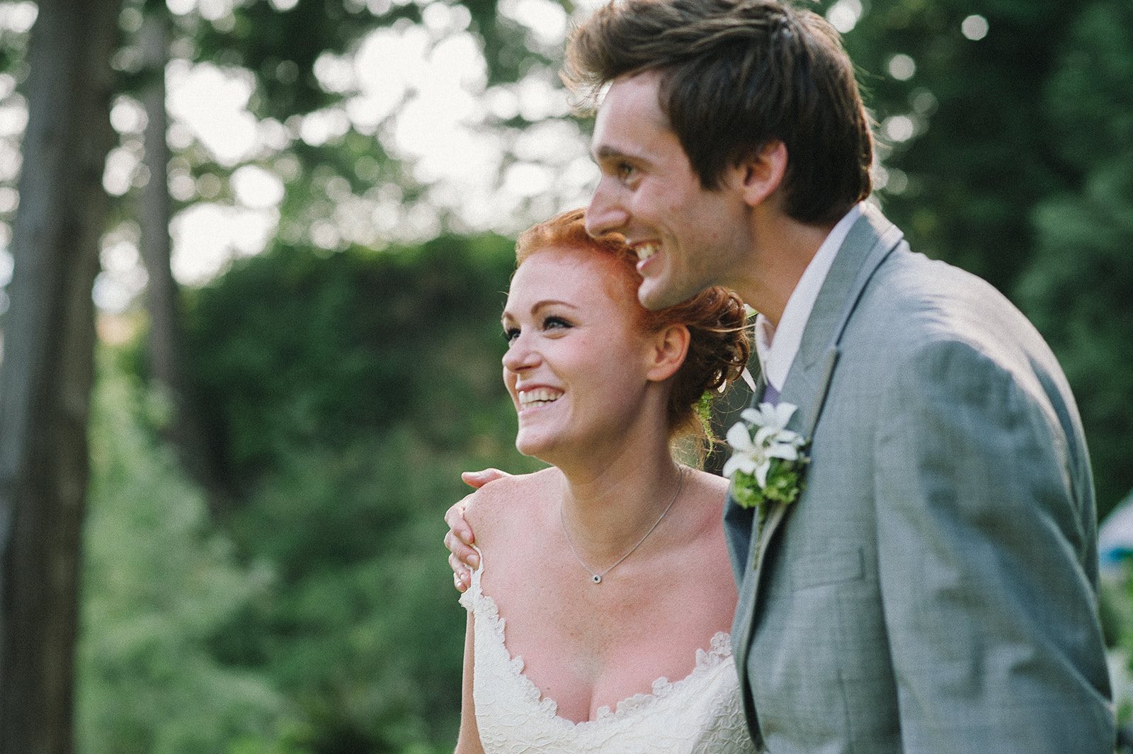 The couple laughing, just married