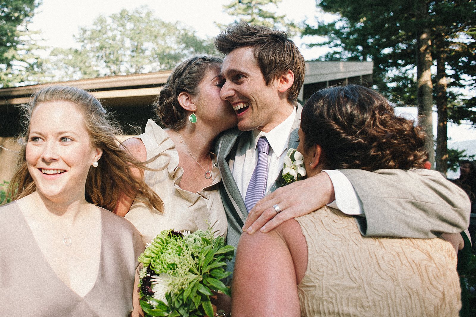 Guests hugging the couple