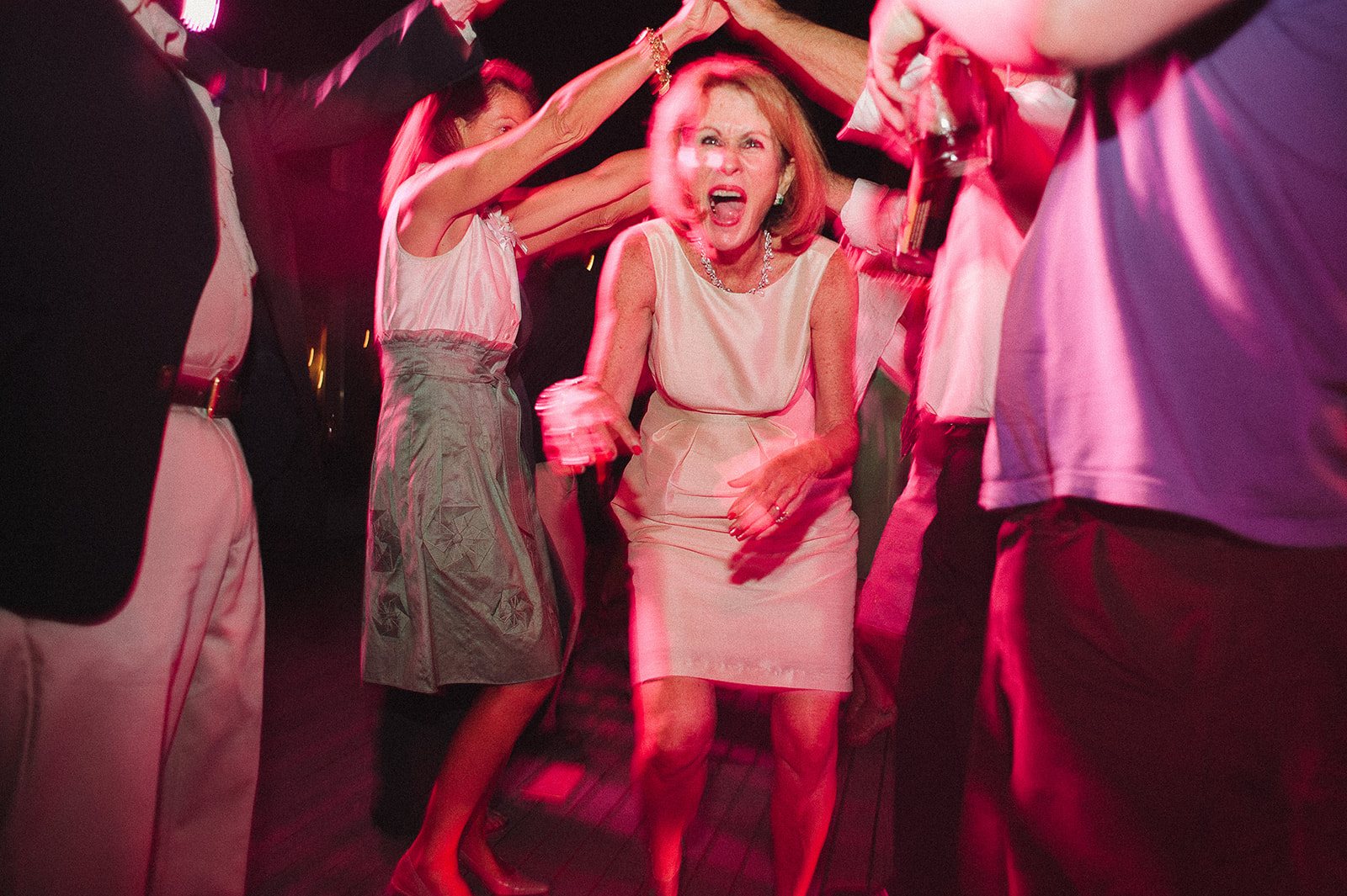 The bride dancing in red light